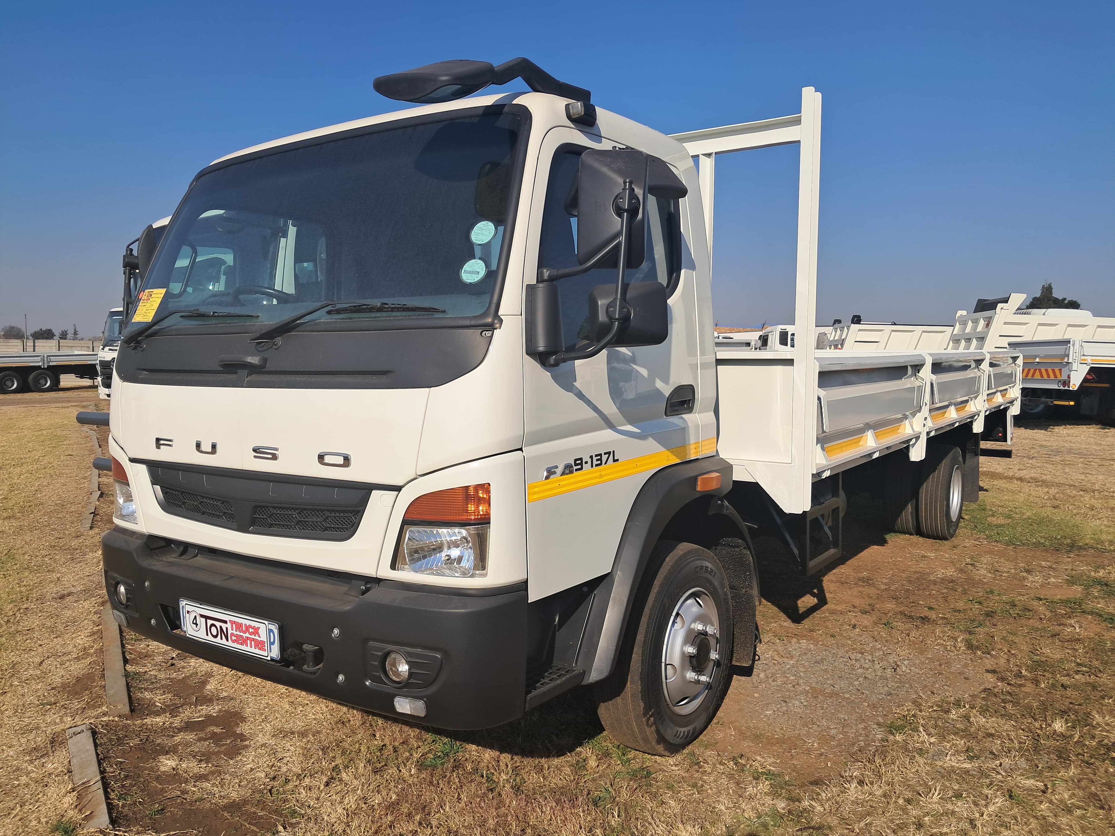 Mitsubishi Fuso FA9-137L Dropside — photo 2